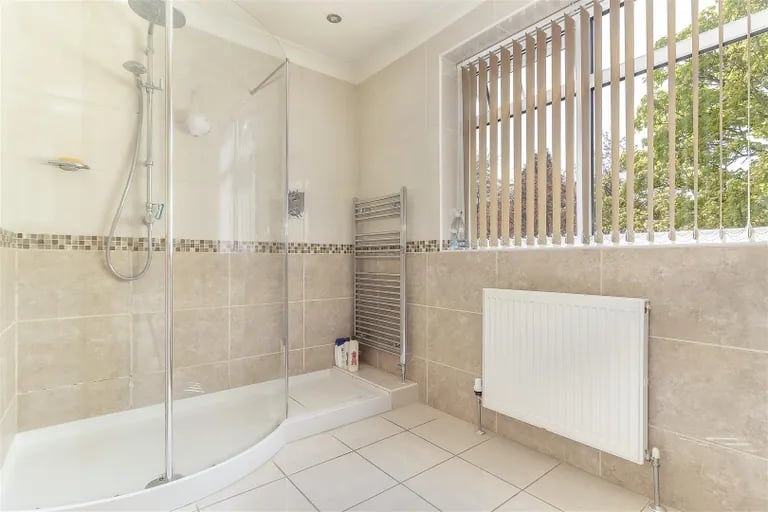 It benefits from its own en-suite shower room with large walk-in shower.