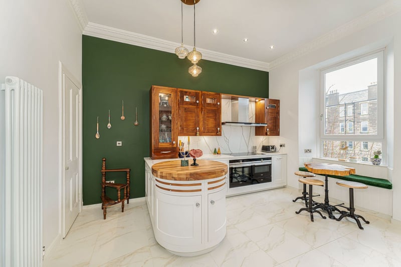 There is a bespoke, made to measure kitchen by Ashley Ann that features high end Siemens Appliances, Quooker boiling tap and stone worktops. A built-in window seat offers space for casual dining and there is a walk-in pantry and separate utility cupboard. 