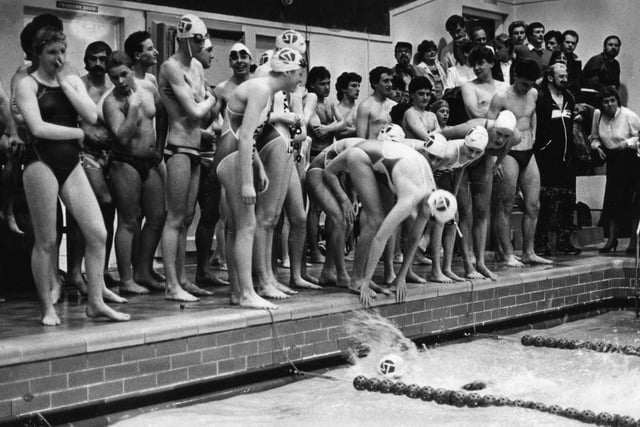 Swimmers from Borough of South Tyneside Swimming Club prepare to change over in the swimming relay of a race in May 1986.