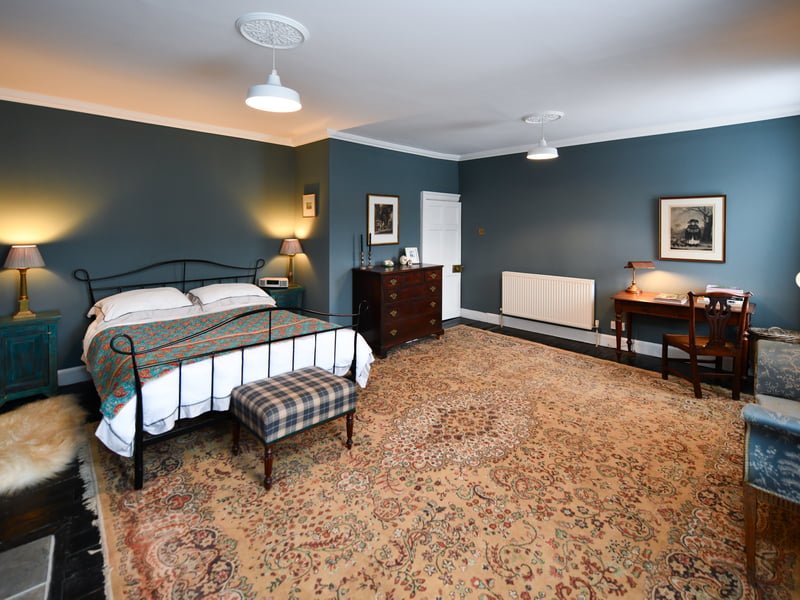 Interior: The inside of the house has been redecorated throughout and features a spacious kitchen, dining room/snug, ground-floor ensuite bedroom, and first-floor sitting room.