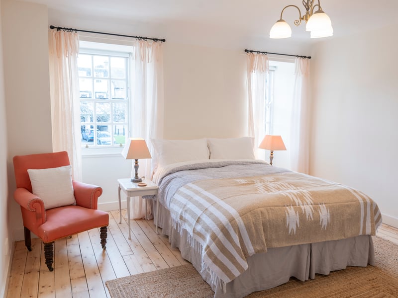 Interior: Its living room is dual- aspect and kept cosy by a wood-burning stove, while the kitchen is contemporary. A spiral staircase leads to the first floor, where there are three bedrooms, and the top storey features a generous principal with ensuite shower room. Adjacent to the second-floor landing is a space now used as storage, but once for hiding priests during the Reformation.