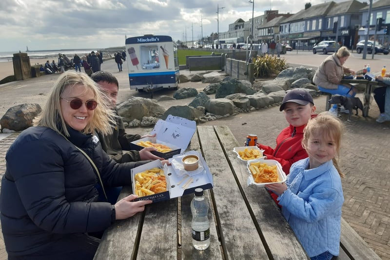 The Kenny family enjoying their fish and chips.