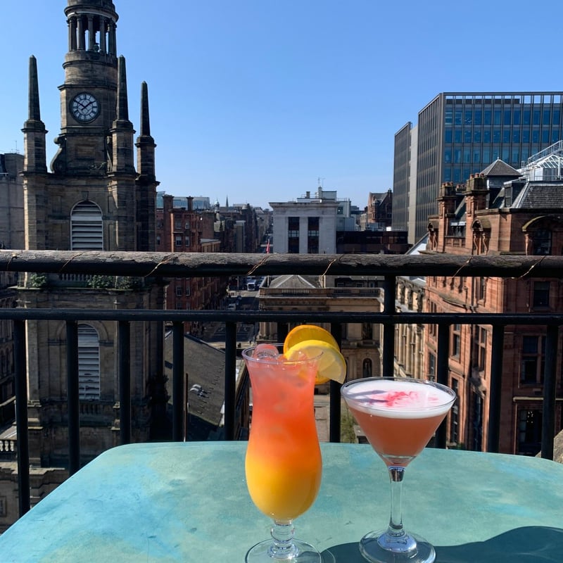 A small, discreet rooftop terrace at the Carlton George Hotel for cocktails and city centre views. 
