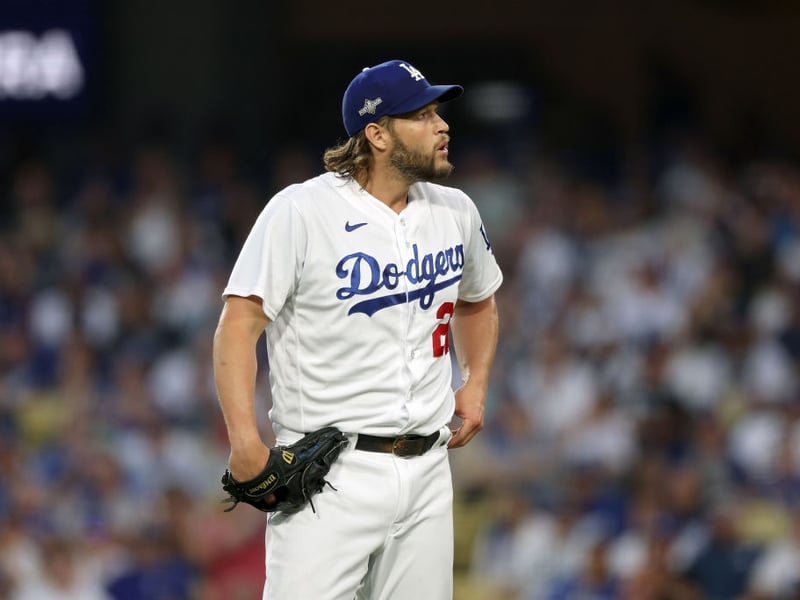 Left-handed pitcher Clayton Kershaw plays for the Los Angeles Dodgers and was a 2020 World Series champion. He's worth approximately $110 million.
