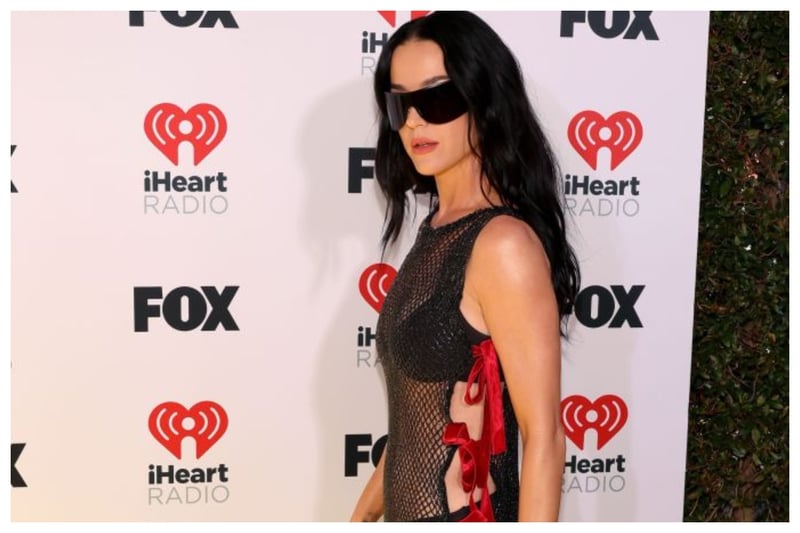 It's a no from me when it comes to Katy Perry's outfit. I hate the 'naked dress' look so it won't be a surprise to you that I am not a fan of Katy Perry's sheer mesh dress with red velvet bows. I love a bow, but not with sheer mesh, it's not a good combination! No wonder Katy Perry is on my worst dressed list 