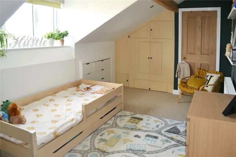 To the top floor is a further double bedroom along with handy storage in the eaves.