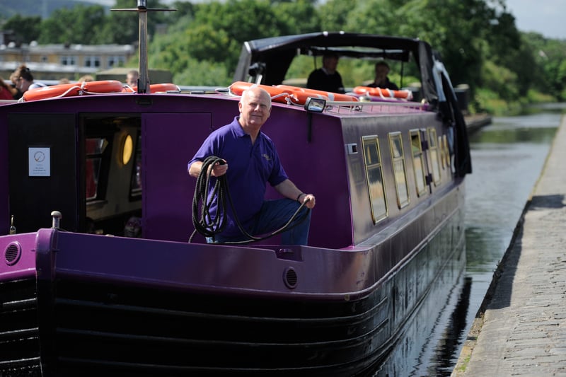Retired cruise ship captain Nic Bates is pictured in August 2012 on the barge on the Union Canal which was let out to take groups up and down the waterways. Nic is taking exams to be able to be the captain of one of these barges.