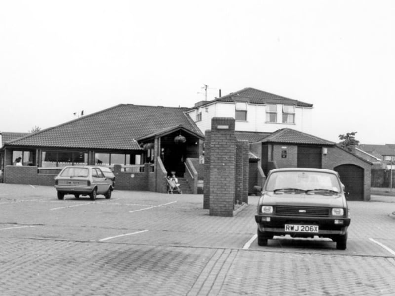 Cars outside the Hawk and Dove pub, on Thorpe Green, Waterthorpe, Sheffield, in September 1987
