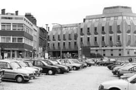 Cars parked in Sheffield city centre, near the 'Egg Box' Town Hall extension, in September 1988