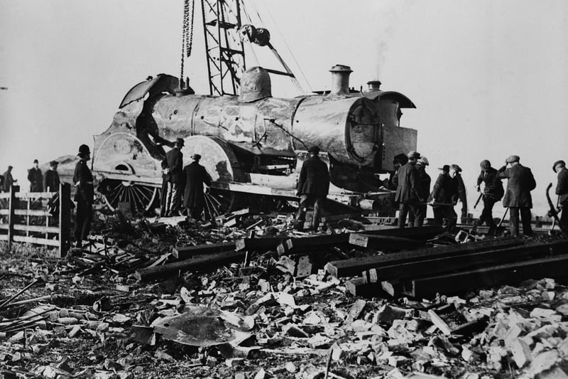The engine amid the wreckage of the Warton signal box in the aftermath of the Lytham rail crash in Lancashire, 4th November 1924. The accident happened the previous day when the Liverpool express travelling to Blackpool derailed after one of the locomotive's front tyres fractured. Fourteen people were killed in the accident
