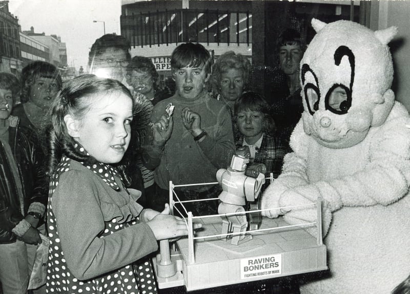 Gloops tries his hand at Raving Bonkers against Karen Toseland, aged seven, at Redgates toy store, Sheffield, in August 1973