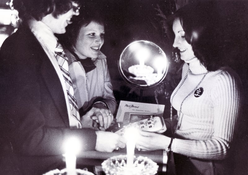 The scene at a jewellery shop on Fargate, Sheffield city centre, as customers are served by candlelight during the power workers dispute in 1973