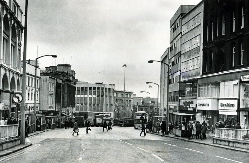 High Street, Sheffield, in 1973, with shops including Saxone, Lilley & Skinner, Bellmans, Hector Powe, Dolcis, C&A and Peter Robinson
