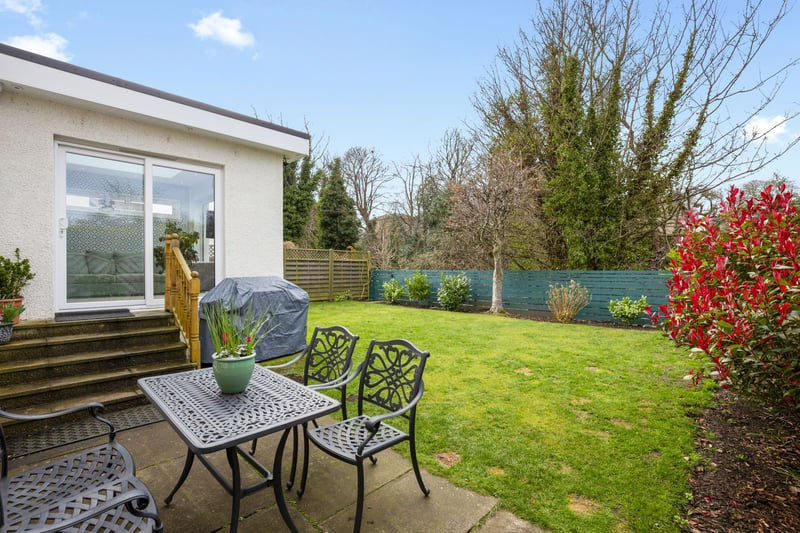 The fully enclosed mature rear garden is laid mainly to lawn, benefiting from an external water tap and power supply. There is also a well tended private front garden incorporating a driveway which leads to the garage.