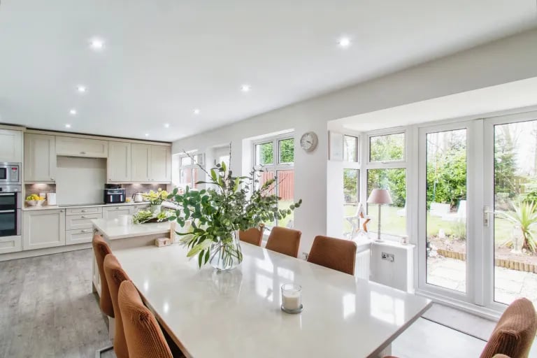 The heart of the home is this gorgeous kitchen diner with sleet solid granite worktops and solid granite dining table.