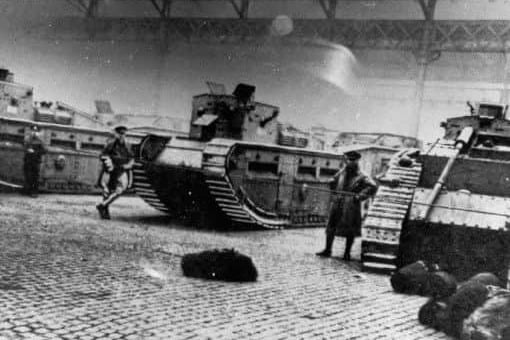 Terrified of a Bolshevik uprising the government eventually sent in 10,000 troops, tanks and machine guns to bring stability back to the city during the Battle of George Square. Pictured here are the tanks billeted in Saltmarket.
