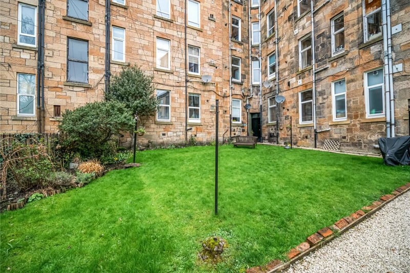 To the back of the property is the well-kept communal rear garden grounds. 