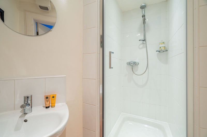 The property's handy en-suite shower room. The windows are double glazed with the exception of the front facing windows which are single glazed and there is gas central heating. Permit and meter parking is available on St Stephen Street.