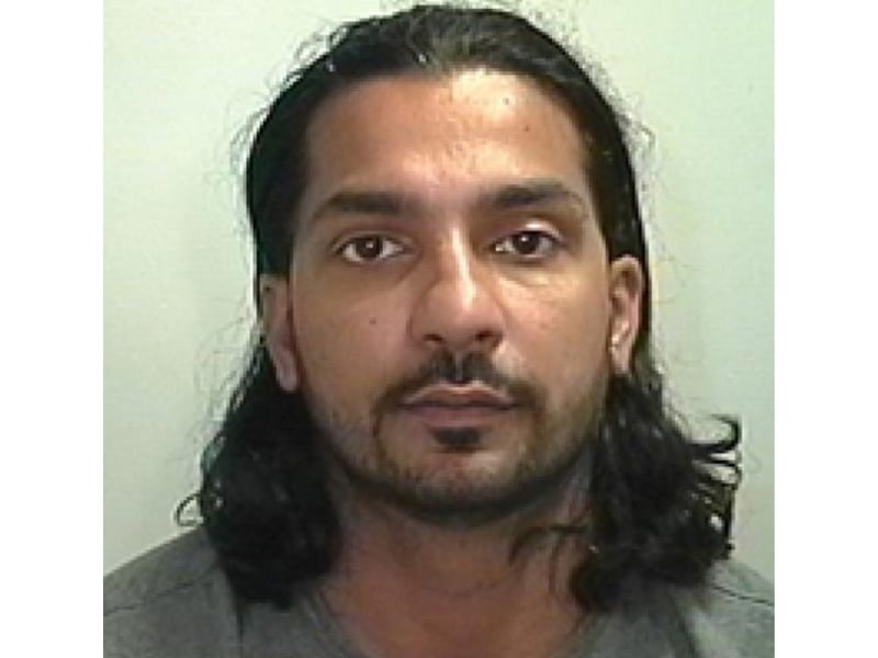Ghafoor took a courtesy car from a dealership in Manchester in August 2013 using a driving license in another person’s name. Police spotted the car and the pursuit ended in the Halifax area when he crashed. His wife and two children, who were also in the car, suffered minor injuries. Cash to the value of £80-100,000 was recovered. There were traces of heroin, cocaine and cannabis on the notes. He was charged with fraud, possession of criminal property, dangerous driving and disqualified driving. Ghafoor was also charged with possession of cannabis with intent to supply after a vehicle was searched in Withington in November 2013 and cannabis worth £245,000 was found. In May 2014 Ghafoor pleaded guilty to dangerous driving. He was due to appear at court in February 2015 in relation to the other charges but failed to answer his bail and a warrant was issued for his arrest. In addition, Ghafoor was charged with possession of cannabis with intent to supply in relation to a separate seizure of cannabis worth £24,000 that was found at a house on Kingsway Avenue, Burnage, in September 2014. He was due to appear in court but failed to answer his bail and another warrant was issued for his arrest.