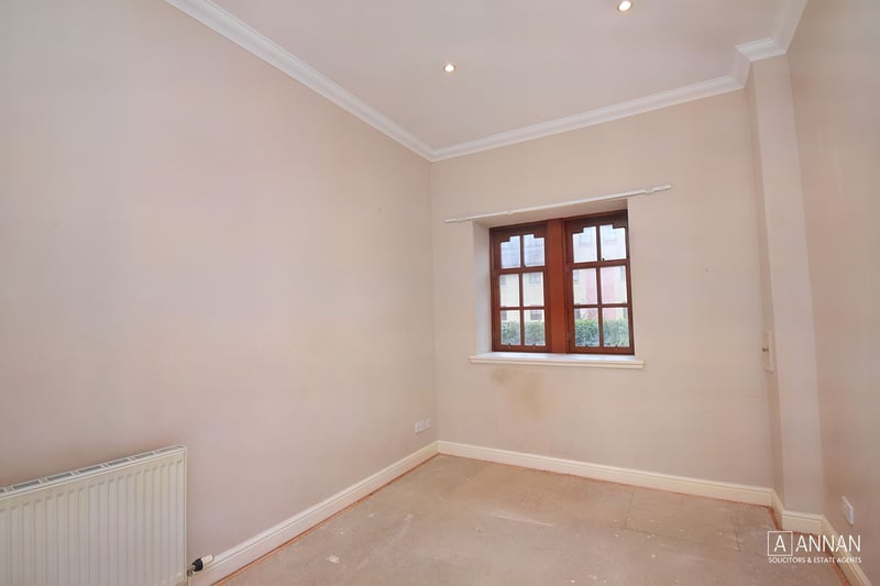 The Duddingston property's third bedroom is situated on the ground floor.