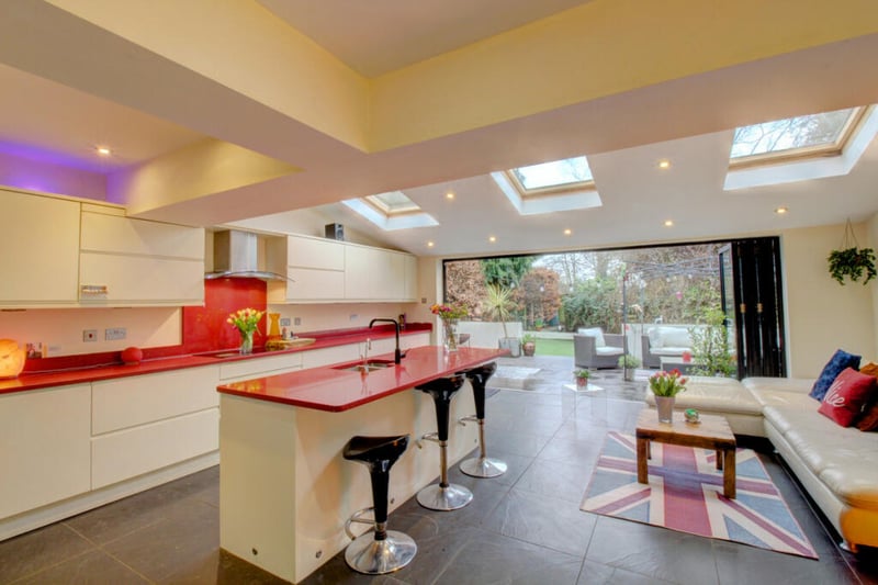 The large open plan living and dining kitchen impresses with its sheer spaciousness.