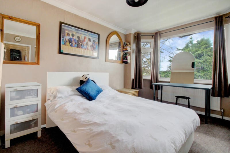 This double bedroom benefits from a gorgeous bay window.