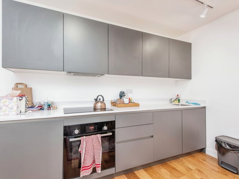 The kitchen is well fitted with ample storage.