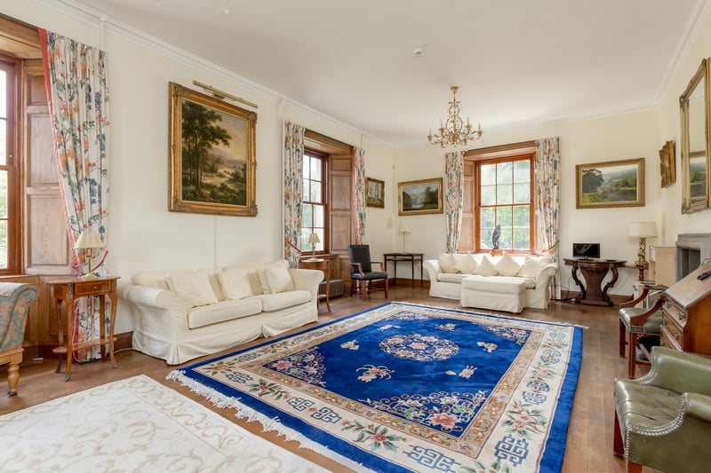 Interior: The generously-sized home has classically Georgian proportions and begins with a spiral stone staircase in the vast reception hall. Rooms include a formal lounge, large drawing room, open-plan kitchen with Aga range and central island.