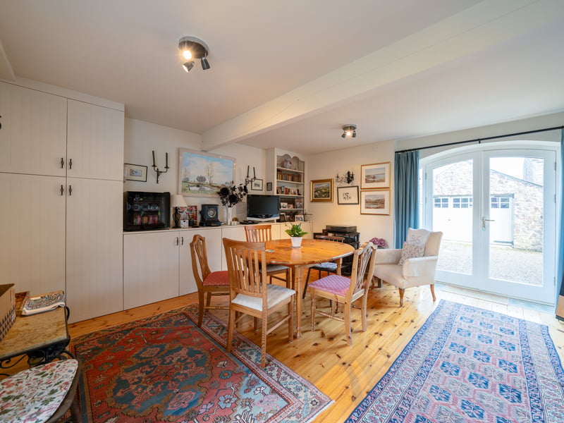 Interior: All of the reception rooms are opulently decorated in keeping with the traditional house, including a drawing room, reception hall, traditional kitchen with Aga and a dining room with elegant curved double doors.