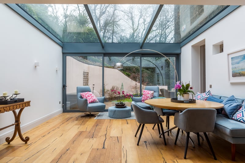 Interior: Dating back almost 200 years, the property has been fully renovated to a very high specification. A contemporary extension brightens the large kitchen/dining space and upstairs, the ensuite principal bedroom features a balcony.
