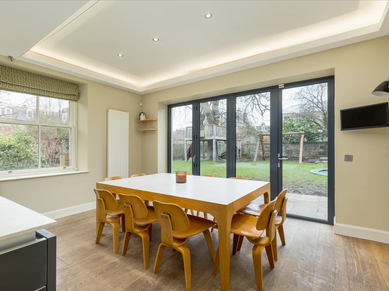Forming the heart of the home is a bright rear open-plan kitchen and dining space.