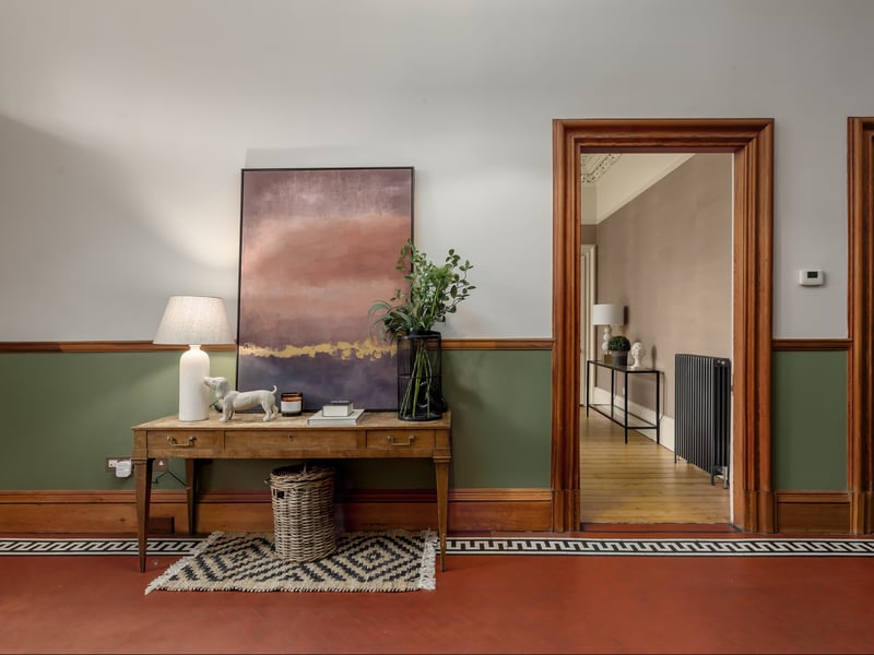 The entrance hall was a real draw for the Rosses. The couple bought the property in January 2020 and Jessica recalls: “We had looked at a few other properties and I had flown over from Africa to see this one and right when I opened the front door, the staircase just caught me.
“It was a beautiful wooden staircase that is original to the property and I hadn't really seen many homes with that.
“Most of the bigger houses had metal railings or stone steps and this was just this gorgeous, rich wood that was so inviting.”