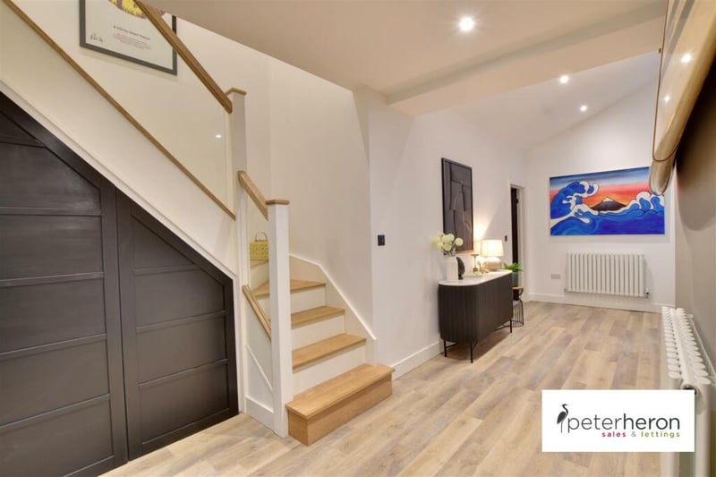 The entrance hall to the property is welcoming and well presented, with a modern aesthetic that is found throughout the home. 