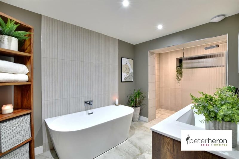 The family bathroom is incredibly well presented with a separate bath and walk-in shower.