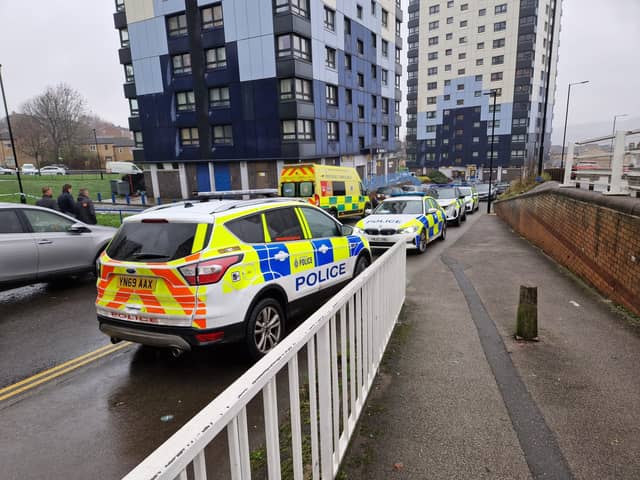 Emergency services outside a tower block on Brightmore Drive, in Netherthorpe, Sheffield, after a woman was found dead in December 2023. Sheffield Council says it has written to all high-rise residents following her death and that of another woman at a tower block in Upperthorpe in July 2022.