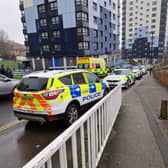 Emergency services outside a tower block on Brightmore Drive, in Netherthorpe, Sheffield, after a woman was found dead in December 2023. Sheffield Council says it has written to all high-rise residents following her death and that of another woman at a tower block in Upperthorpe in July 2022.