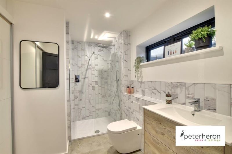 Just off from the principle bedroom is an ensuite bathroom, complete with a rainfall shower.