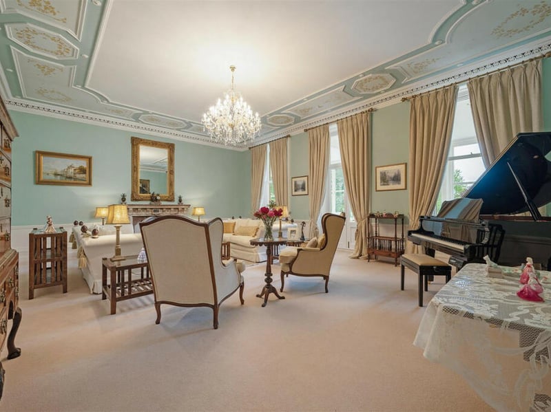 Floor-to-ceiling windows and intricately carved roofs are just a few special features of the property