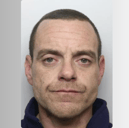 James Baldwin, aged 39, also goes by the name Shane Clayton. He is wanted by South Yorkshire Police in connection to reports of stalking and criminal damage in Sheffield.