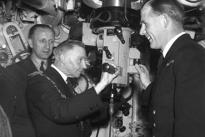 The Mayor of Sunderland tried out the controls of the submarine U776 in Sunderland in 1945.