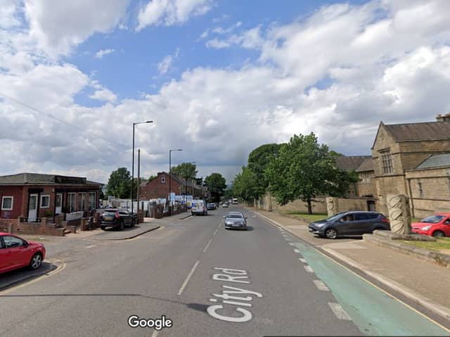 Undertakers directed traffic after a shocking car crash drama on City Road, Sheffield, outside the cemetry. Picture: Google