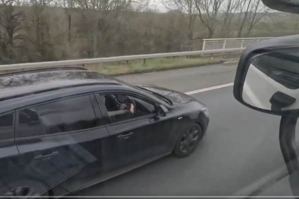 A motorist filmed using their phone by police. Photo: South Yorkshire Police