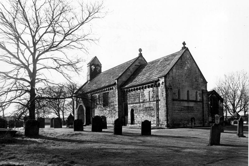  St. John's Church and graveyard. pictured in March 1950.