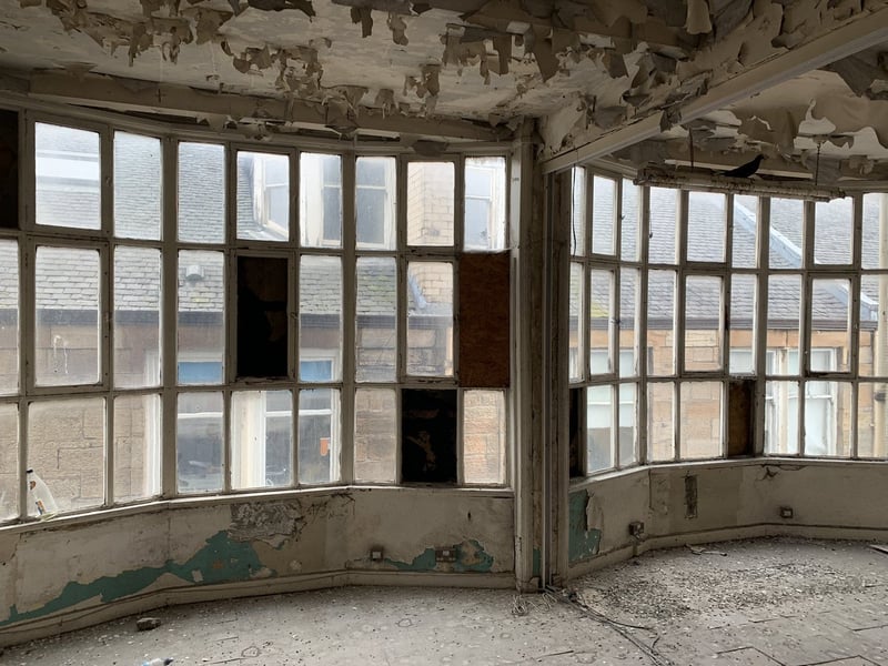 Around 25% of the windows in the Lion Chambers have been boarded over due to safety reasons - despite this the building is a common victim of vandalism.