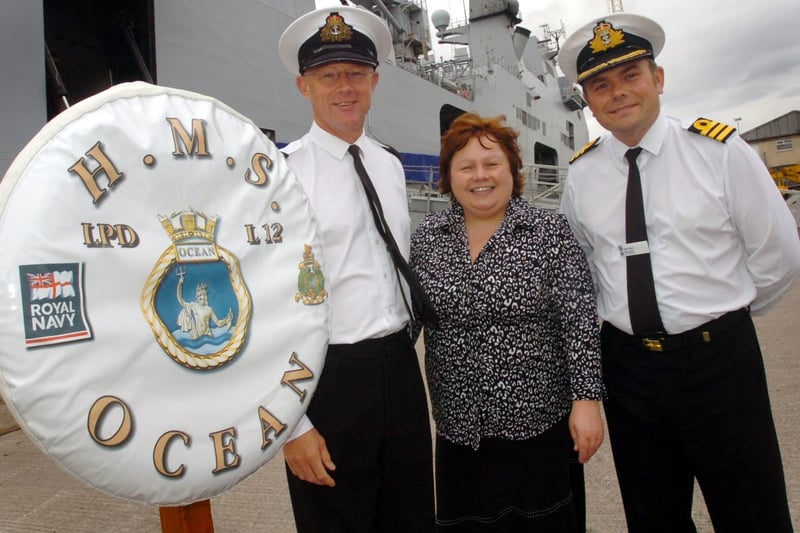 Lauren McLennon from Grace House visited the ship to collect a cheque for more than £2,000 from chaplain John Morris and Commander Mark Taylor.
