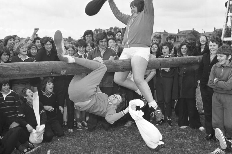 Broughton secondary school sports day in June 1973 - girls taking part in the pillow fight.