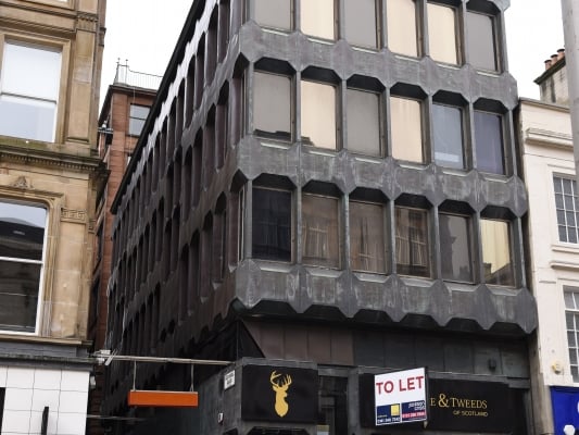 Hidden in plain sight on Buchanan Street, you won't be able to miss it now. Built for the British Overseas Airways Corporation (BOAC) in 1970, the building has a steel frame with a copper cladding on the upper-floor, noticeable by its grid-iron hexagonal window openings.