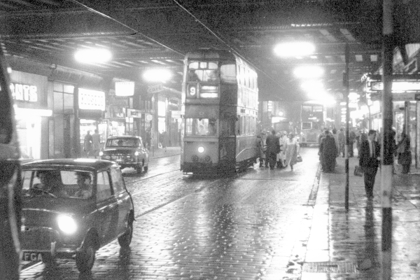 A tram passes underneath the Hielanman's Umbrella on Argyle Street in 1962.