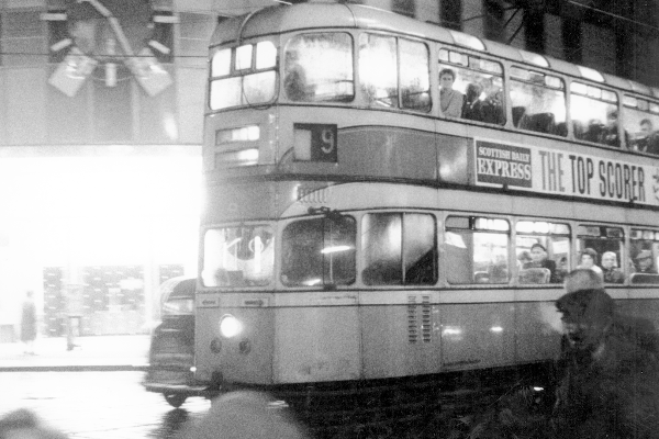 The coronation tram passes the old Boots on the corner of Argyle Street in 1962