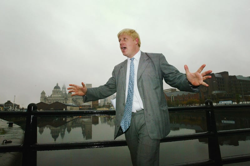 Then Editor of The Spectator Boris Johnson poses at Albert Dock during his visit to Liverpool on October 20, 2004. He made a formal apology to the people of Liverpool after his magazine published an article which described the city as being 'hooked on grief' following the murder of Liverpudlian hostage Kenneth Bigley. 